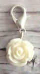 Memory lockets dangle rose off-white